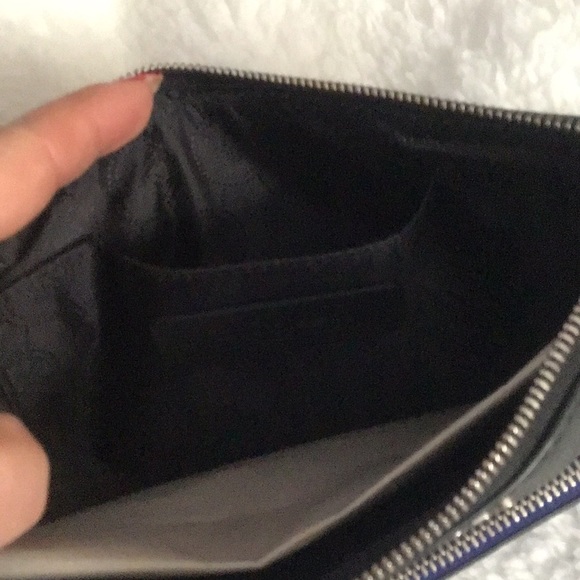 MICHAEL KORS LG ZIP CLUTCH
